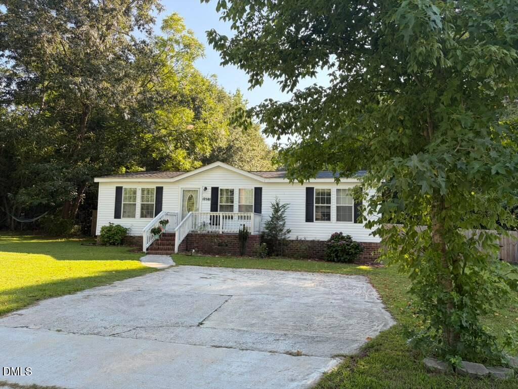 Photo of 12581 South Street, Whitakers, NC 27891 (MLS # 10192386)
