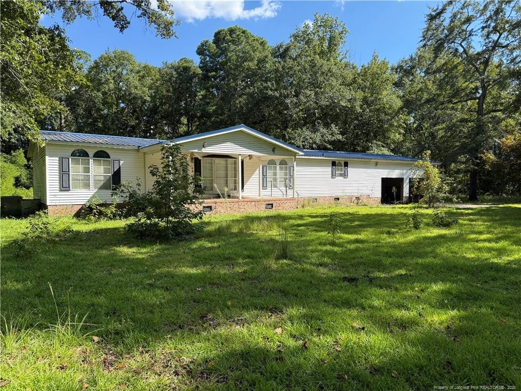 Photo of 146 Nascar Drive, Red Springs, NC 28377 (MLS # LP768988)