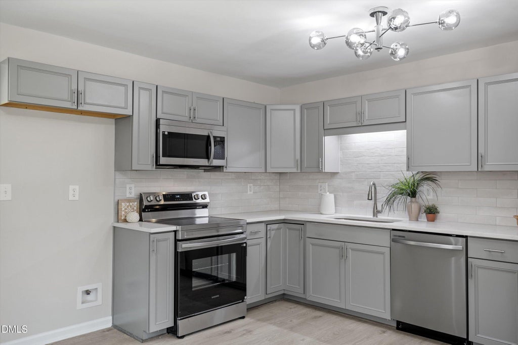 Photo of 623 Belvin Avenue, Durham, NC 27704 (MLS # 10192427)