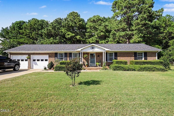 1412 SPRING DR, GARNER, NC 27529 - Image 7b30b9eb63544ae8aa3132d0b3b403ae/1457861671