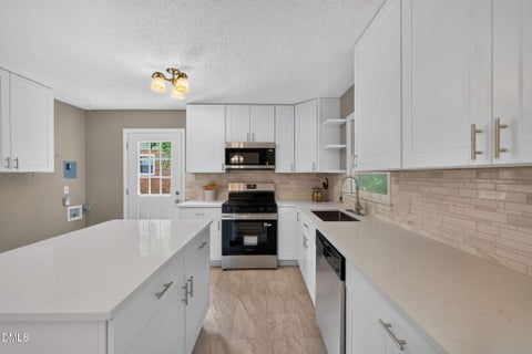 Photo of 1513 N King Charles Road, Raleigh, NC 27610 (MLS # 10175325)