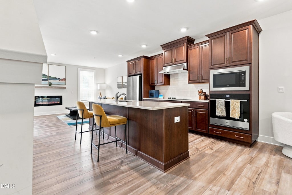 Photo of 11549 Helmond Way #107, Raleigh, NC 27617 (MLS # 10192532)