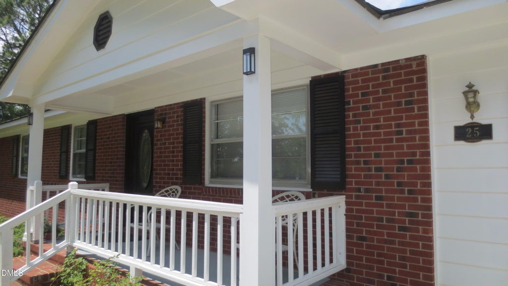 Photo of 25 E North Street, Angier, NC 27501 (MLS # 10192432)