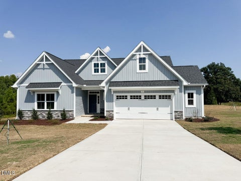 Photo of 35 Torrent Lane, Zebulon, NC 27597 (MLS # 10182417)