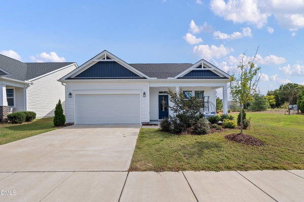 710 BRIAR GATE DR, HOLLY SPRINGS, NC 27540 - Image c5550c84156bf69fe1a9bfe1858baf8d/3511774866