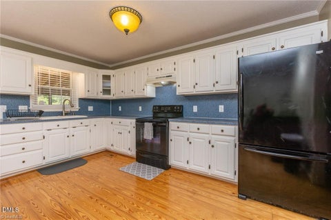 Photo of 5714 Rolling Meadows Road, Randleman, NC 27317 (MLS # 10179145)