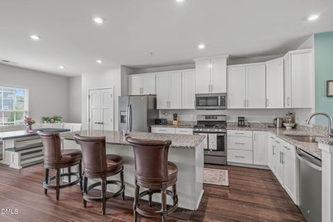Photo of 1092 Ambergate Station, Apex, NC 27502 (MLS # 10173454)