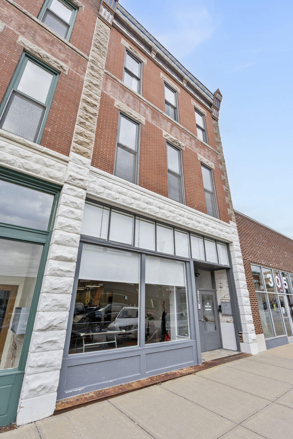 Welcome to 311 W Commercial Street. Renovated lofts located on floors 2 + 3 above a leased commercial space. Unit 1 is a studio with bathroom, Unit 2 has 2 possible bedrooms with a full bathroom, and Unit 3 contains 3 bedrooms with 2 bathrooms. Street parking available. Licensed for short term rentals. Long term history of solid rents in the 3 lofts. Please note: this does not include the retail lease space.