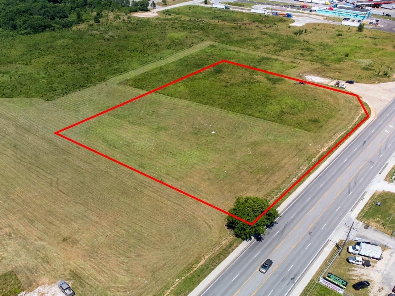 4.7 acres of excellent commercial ground ready for development. Super high traffic location with quick access to Hwy 249 and I-44.