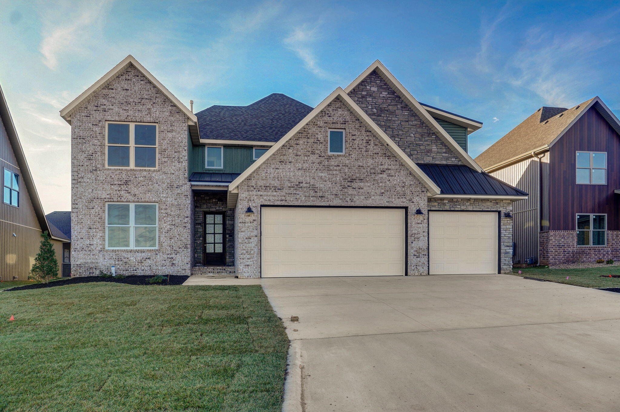 Indeed, the Woodvale community redefines the standard of living, and with Oller Building Company, custom features become the norm, elevating your home to a new level of sophistication and comfort. Every detail has been meticulously considered to transform your house into a true home, reflecting your style and preferences.With Oller Building Company, expect nothing less than excellence in craftsmanship. Custom iron handrails add a touch of elegance to the staircase, showcasing the commitment to personalized and high-quality design. Soft close cabinets throughout the home not only enhance the overall aesthetic but also contribute to a quiet and seamless living experience.The kitchen is a masterpiece with cabinets reaching the ceiling, providing ample storage space and creating a visually stunning effect. Glass uppers add a modern and open feel, allowing you to showcase your favorite dishes or decorative items. The emphasis on customization continues in the bathrooms, where tile showers bring a luxurious and spa-like atmosphere to your daily routine.One of the standout features of the home is the 18ft tall stone fireplace, becoming a focal point that adds warmth and grandeur to the living space. This custom design element is a testament to the dedication to creating homes that go beyond the ordinary, offering a unique and inviting atmosphere for residents.In the Woodvale community, Oller Building Company is not just building houses; they are crafting homes with character and personality. Each custom feature is carefully integrated to ensure that your living space is not only aesthetically pleasing but also functional, meeting the unique needs and preferences of the homeowners.