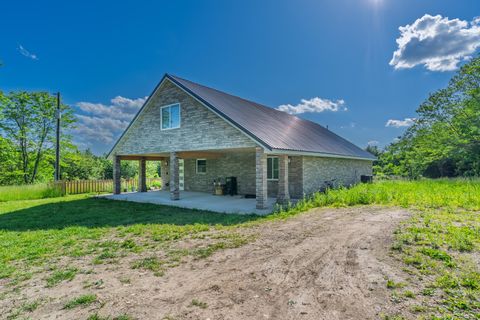 Photo of 10481 N Farm Rd 149, Pleasant Hope, MO 65725 (MLS # 60311735)
