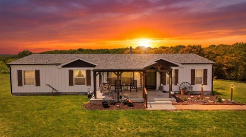 Photo of 12507 U.S. Route 66, Conway, MO 65632 (MLS # 60323813)