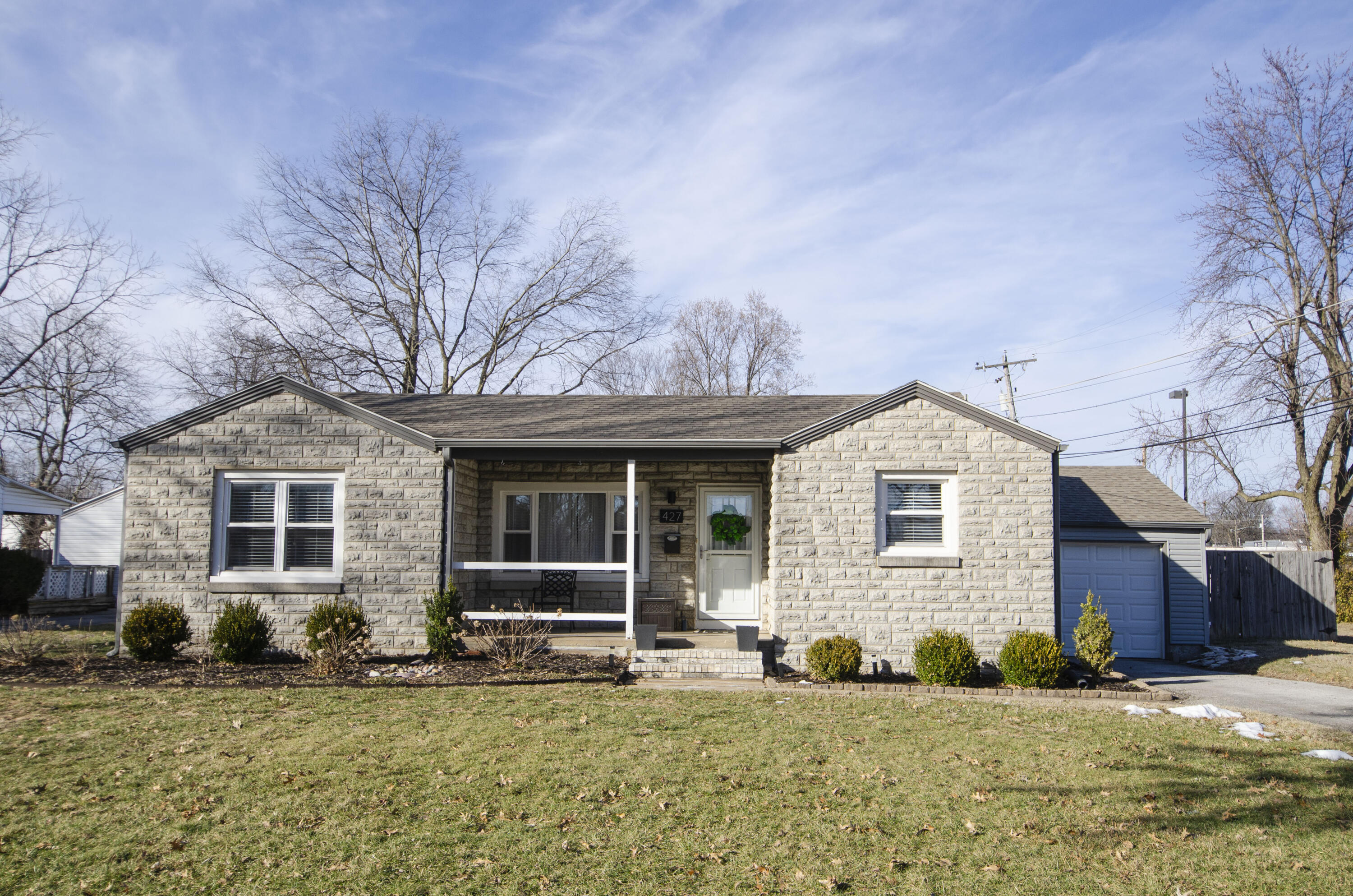 This darling 2BR/2BA mid-century ranch has been entirely remodeled in 2018! New roof, HVAC system, water heater, siding, all new flooring, lighting, plumbing, walls, trim and windows offer a beautilfully finished, move in condition home.Versatile, open concept floor plan with spacious living room, formal dining or office area, breakfast nook and all new kitchen with beautiful cabinets, concrete countertops, newer appliances, including side by side Samsung stainless refrigerator. Large laundry room with plenty of storage and washer/dryer stays. Two bedrooms including a Master Suite with custom, tile, walk-in shower and and built in shelving for storage. Backyard is perfect for entertaining with privacy fence, covered, screened-in porch and open deck. There's additional storage for lawn equipment at the back of the home.This home will not last long!!