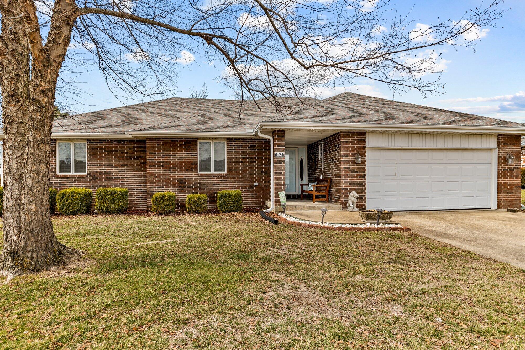 MOTIVATED SELLERS!!  PRICE IMPROVEMENT!!  All brick 3-bedroom 2-bath ranch on a quiet street near John Playter Park in Lakewood Hills Subdivision! With a maintenance-free exterior and a newer roof(Replaced in June 2022), this home offers lasting peace of mind. After entering the foyer, The vaulted ceilings of the living room and the warmth of the free standing gas fireplace welcome you into an open, airy space perfect for relaxation and entertainment. If that is not enough, you can enjoy your morning coffee in the fabulous sunroom which is independently heated and cooled. The kitchen and dining area is perfect for those family gatherings as it is open to the living room. The Master Ensuite includes a large bedroom with a full master bath and walk-in closet. This home has been well taken care of and is move-in ready!  Call today for your private showing.