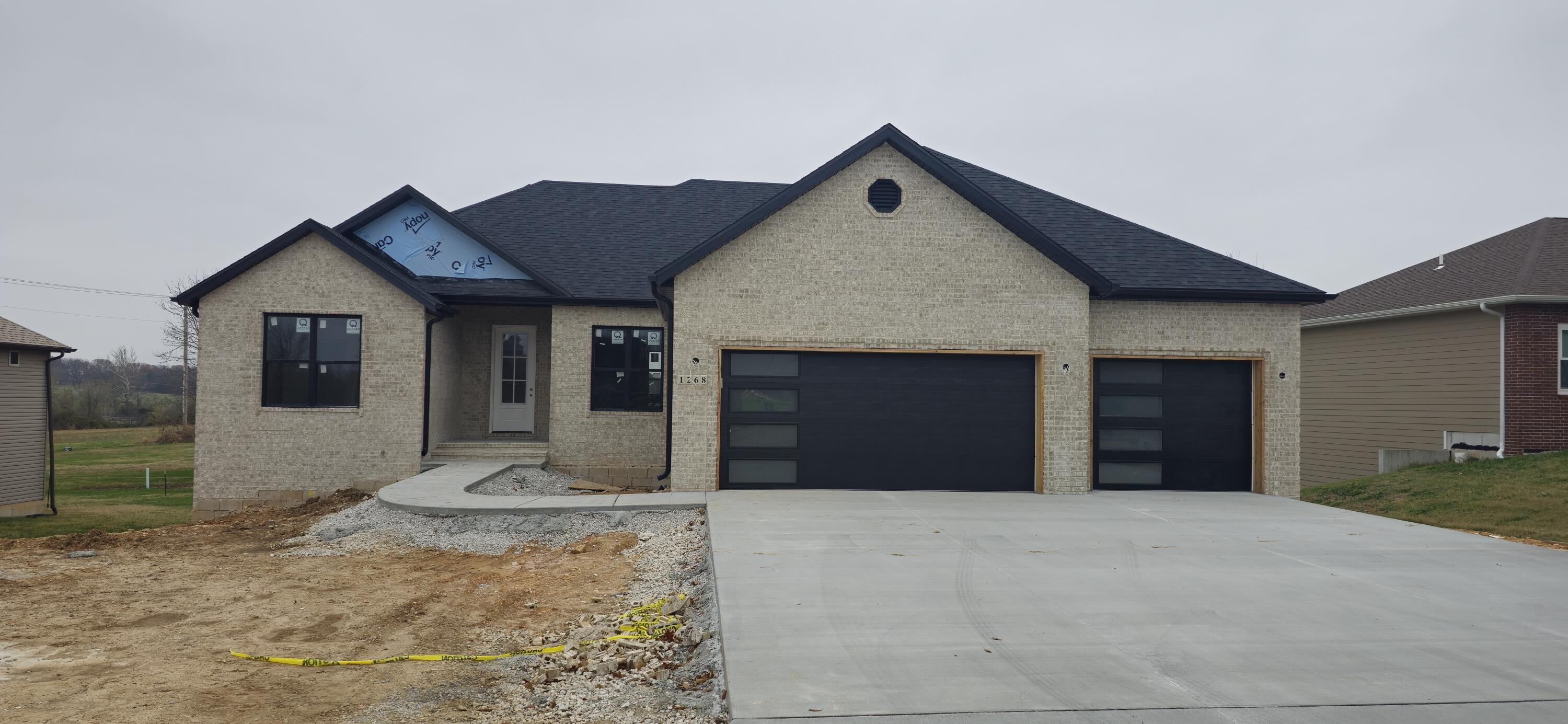 Welcome to luxury living in Stonebridge Estates!This stunning new build offers an exceptional blend of modern design and comfort in one of the area's most sought-after communities. Featuring 5 spacious bedrooms, 3.5 beautifully appointed bathrooms, and a 3-car garage, this home is perfect for both family living and entertaining. The open-concept layout showcases a gorgeous kitchen with a large island, ideal for hosting gatherings. Relax by the fireplace on the main floor or retreat to the walkout basement where you'll find another cozy fireplace and additional living space.Perfectly situated near award-winning Bolivar schools, parks, eateries, and shopping, this home is far from an ordinary spec build. It's a blank canvas for you to personalize with your own finishing touches! Don't miss the chance to make this exceptional property your home.