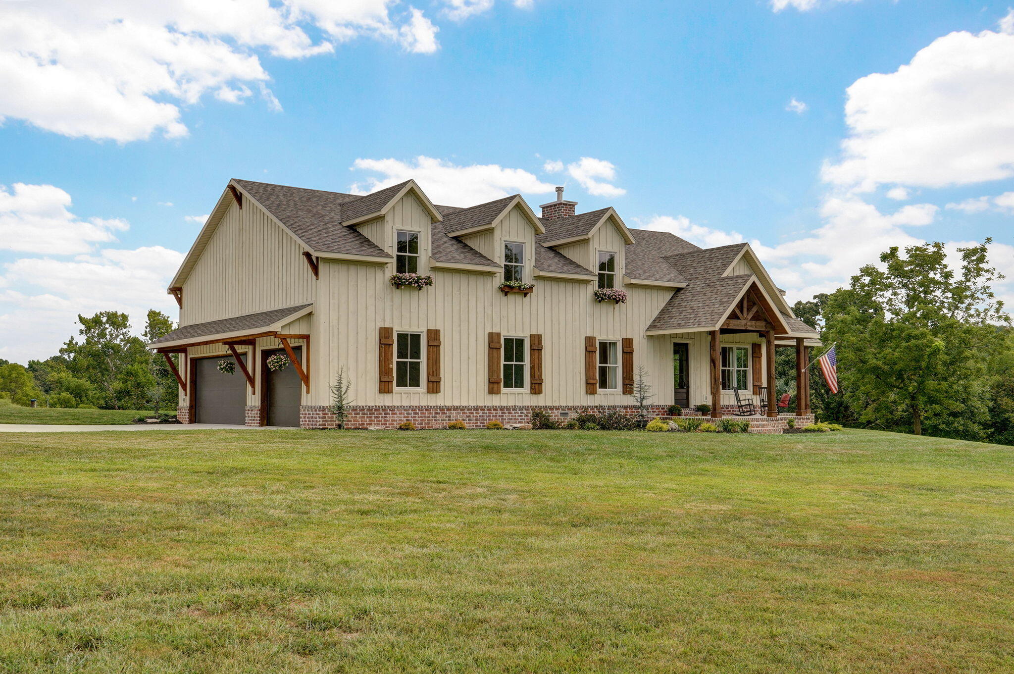 Check out this over 4,000-sf custom built home on 5 acres just outside of Springfield. If you want seclusion and privacy with the convenience of being minutes away from everything then look no further! The builder wanted the exterior to have that old world country feel and as you can see, he nailed it. All of the porches even have tongue and groove wood ceilings! You have to see the custom-built kitchen to truly appreciate it. The huge island, the upper cabinets that go all the way up to the ceiling, the custom hood, the triple window above the farmhouse sink are just a few of the highlights. Everywhere you look you will notice all of the details and craftmanship, from the spindle and railings that were hand forged by a local blacksmith to the 7-piece custom door headers throughout to the high efficiency wood burning fireplace that can heat the entire home! The land is as beautiful as the home itself!  Amazing views in every direction.  You can even see the James River valley in the fall and winter once the leaves have fallen! There is abundant wildlife as well.  You need to see it for yourself! Priced below appraisal so schedule your showing today before it's gone!!