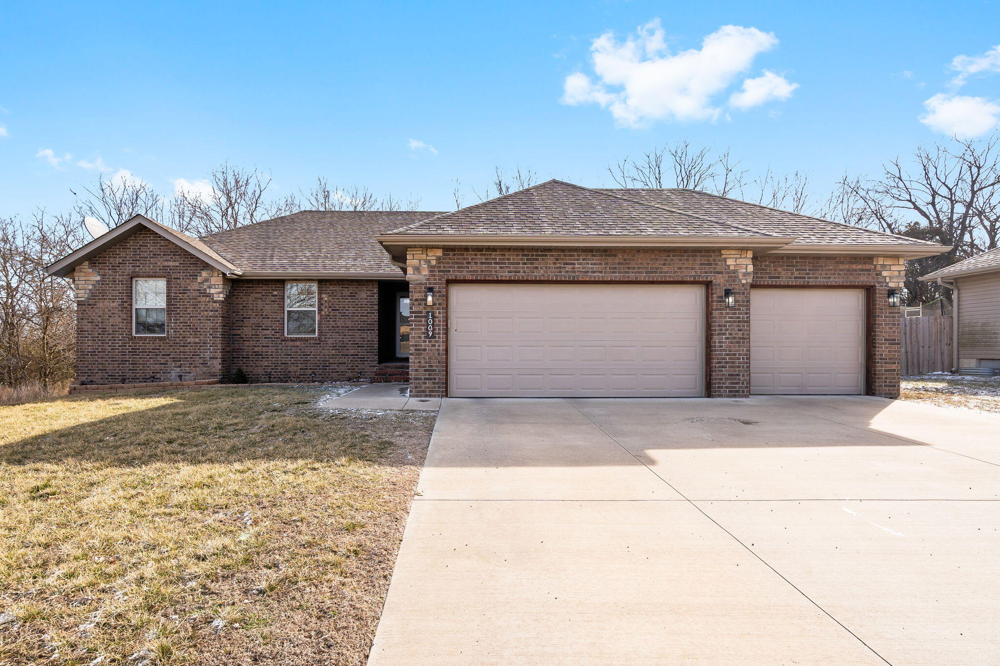 Don't miss this stunning 3-bed, 2-bath home in the sought-after South Wind subdivision! Built in 2019, this home is in excellent condition and features an open floor plan with high-end touches throughout. The kitchen boasts granite countertops, and the stainless steel appliances stay. Enjoy hardwood, tile, and carpet flooring, plus a spacious back deck perfect for relaxing or entertaining. With a 3-car garage and a fantastic location, this home is a must-see.