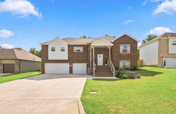 1406 E COMMAND CT, NIXA, MO 65714 - Image 559ec517b5e963aba117b55e2c657f28/1285575341