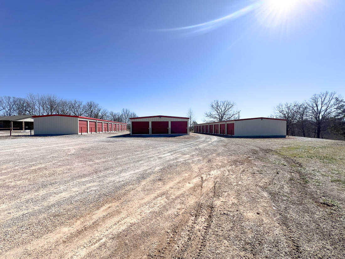 Prime Investment Opportunity near Bull Shoals Lake - 90 Storage Units, Duplex, and Room for Expansion!90 Self-Service Storage Units: These fully operational storage units come with high-tech security cameras that provide 24/7 surveillance, ensuring peace of mind for both tenants and owners. Duplex with Airbnb Potential: The property features a well-maintained duplex, with each side offering 3 bedrooms, 1 bathroom, and an open-concept floor plan. Currently being used as a successful Airbnb rental, it generates steady income and is a great short-term or long-term rentals. RV Site with Full Hook-Ups: The property includes an RV site with full hook-ups, ideal for additional income or offering accommodation for visitors to the nearby lake. Expansive 6.97 acres of land: With nearly 7 acres of land, there is substantial room for further development, whether it's expanding the existing storage units, adding additional rental properties, or creating more recreational spaces. The property is just a few miles from Bull Shoals lake, offering residents and tourists easy access to boating, fishing and outdoor recreation. This is a unique opportunity to acquire a property with diverse income potential. Whether you are looking for a profitable, low-maintenance investment, or a property with room to grow, this listing is one that you won't want to miss.