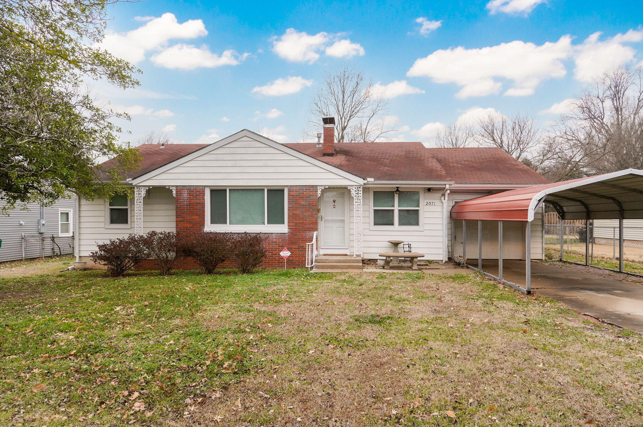 PRICE REDUCED!!! Don't miss this adorable, conveniently located home! Close to Mercy Hospital, Missouri State University and Bass Pro. No carpet in this one. Original hardwood floors have been gorgeously refinished and new luxury vinyl plank flooring installed in rooms which do not have hardwoods. New windows throughout. Large living room with fireplace and refinished ceiling with new can lighting. Formal dining room with built ins or use it as an office. There is also a sunroom or additional living area or office space! Three nice sized bedrooms. Large laundry room. There is also a one car attached garage and fenced back yard.
