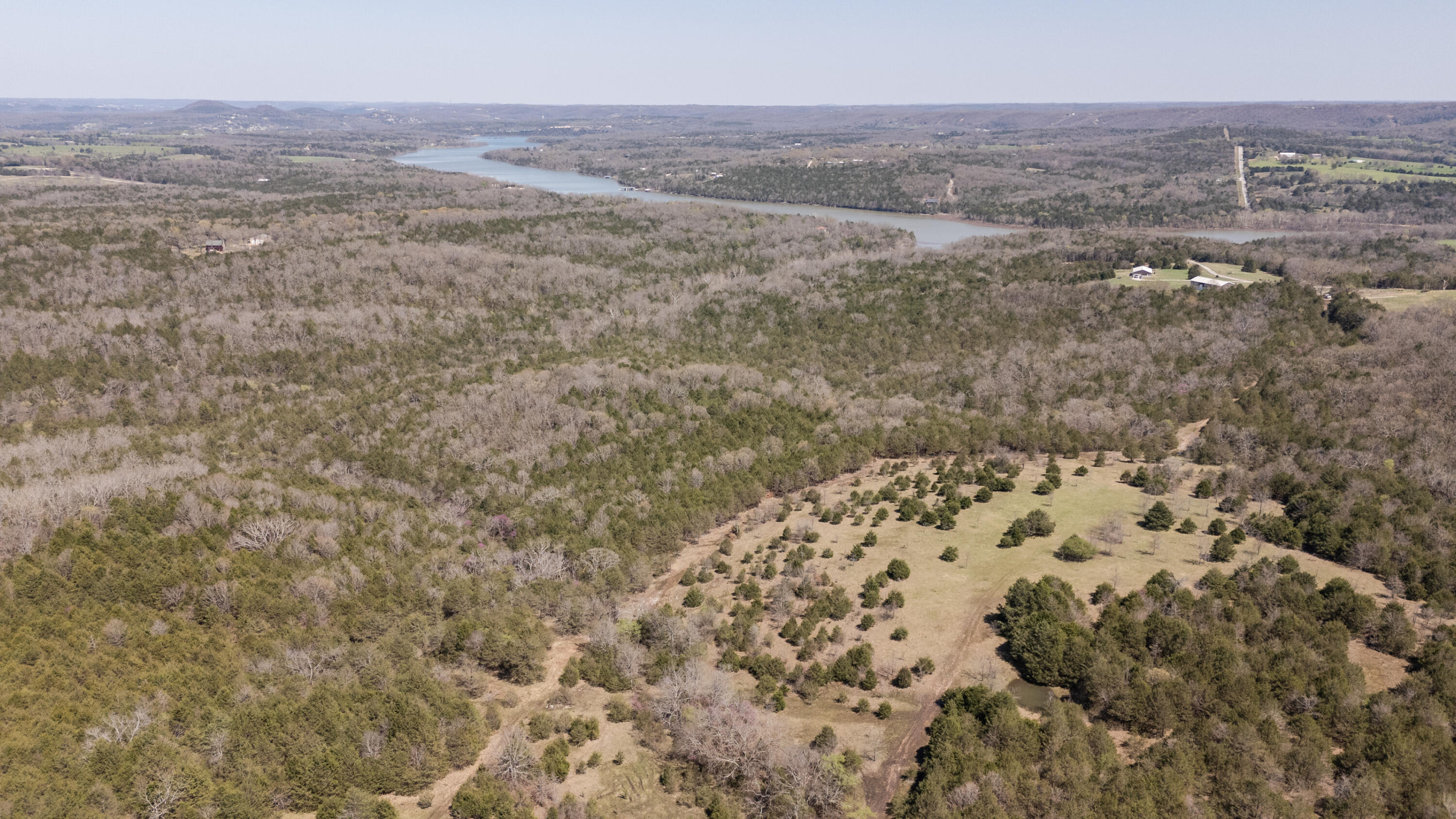 Gorgeous 250 acre m/l property close to Table Rock Lake Shell Knob Mo.Would be beautiful spot to develop however you liked ! Build you dream home/cabin  or retreat for get always etc ! Mostly wooded full of wildlife and privacy! Look at pictures!