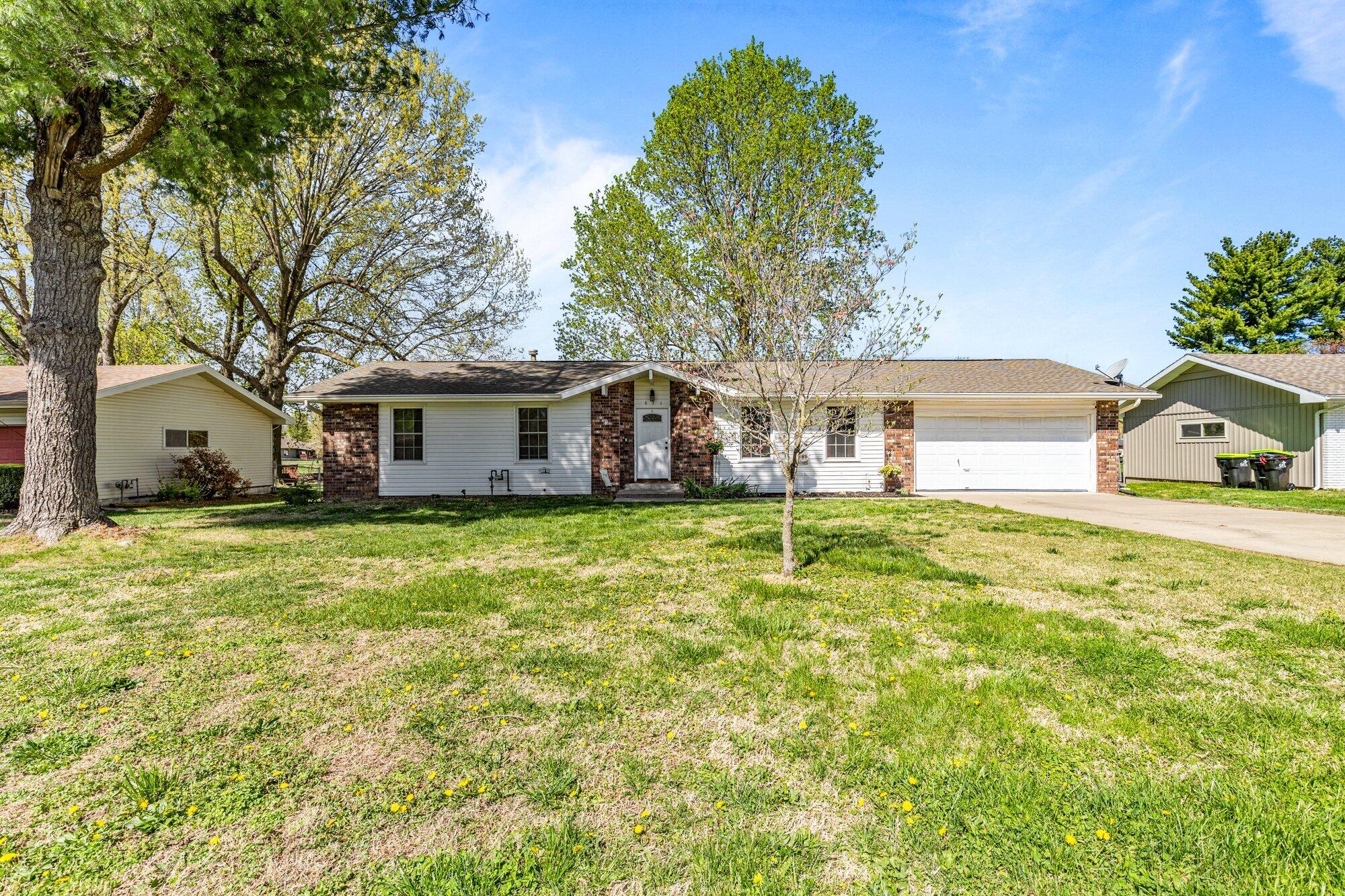 Discover easy, stylish living in this charming 3-bedroom, 2-bath ranch home in desirable Republic, MO! With a maintenance-free exterior and a newer roof, this home offers lasting peace of mind. Once you enter the foyer, you will enjoy the beautiful new flooring throughout. The living room welcomes you into an open, airy space perfect for relaxation and entertainment. Cozy up to the wood burning fireplace, creating warmth and ambiance that includes custom bookcases on either side. Refrigerator, washer, and dryer included. This home is truly move-in ready, awaiting your personal touch. Don't miss out on this fantastic opportunity!