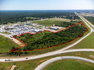 Talk about VISIBILITY! Over 1000 ft of frontage along I-44 and over 1300 ft of frontage along the I-44 E ramp to Hwy 249 South. This is a fantastic location if you want to be SEEN! Access road from lighted intersection on the East side of Flying J.