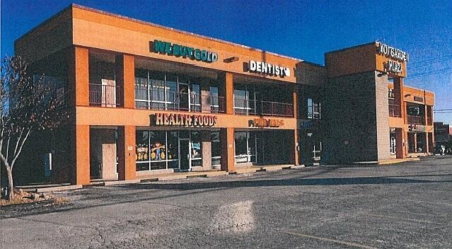 Koi Garden Plaza - Great location on Main Steet in Branson.  Two story complex with stair and elevator to second level.  Easy access into and out of parking lot off of side street with traffic light to ease turning left and right onto Main Street.  Front of building faces Main Street.  Sign structure displays tenant's signage.