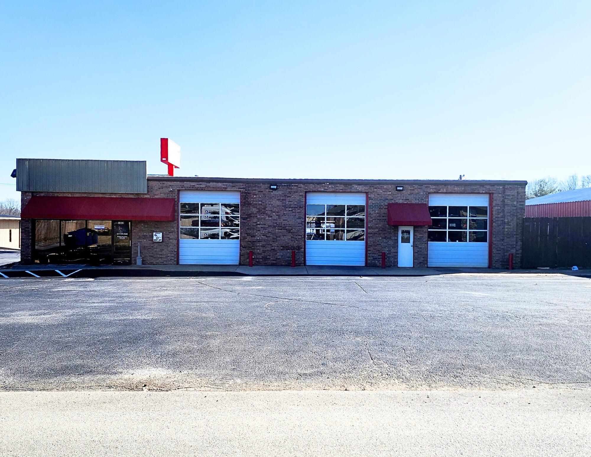 An established auto repair shop in Nixa; this 6+ bay shop has new LED shop lights, room for 7 lifts, an alignment machine, and excellent Hwy 160 signage.   It is all brick, with over 25 parking spaces, nice office and waiting areas, and plenty of storage.  Overhead door sizes and locations include three doors facing Deffer Dr that are 12 ft tall X 10 ft wide, one door on the north side that is 12 ft X 12 ft, and two doors facing Hwy 160, both of which are 10 ft tall, one 14 ft wide, and one 10 ft wide. The property is located in Christian County and has C-2 zoning. Some of the equipment may be available for purchase separately. 2024 Property Taxes are $4,174.  Liberty Electric 800-206-230.  Spire Gas 800-582-1234.Please do not disturb the Tenant.