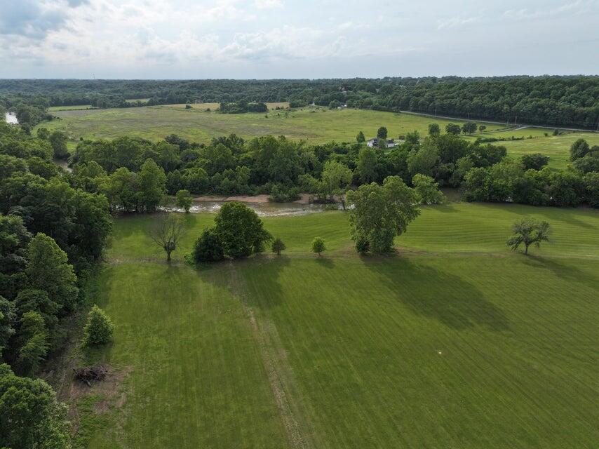 Extra Large 22 Acre Premium Tract Now Available, river front in exclusive Pierre's Riverpointe! Discover a serene, private community nestled along the picturesque Finley River on 87 acres. This 22.35-acre lot is a nature lover's dream, nestled within a newly developed, gated 15-home neighborhood, this property offers the perfect blend of peace, adventure, and natural beauty. The community offers an impressive 4.53-acre common area, featuring: Finley River access, a riverfront pavilion with a covered kitchen and seating area, Private fishing spots, Fire pits for cozy evenings, Scenic walking trails, A dedicated dog park... and more! With the Finley River winding through, you'll enjoy breathtaking views, abundant wildlife, and unparalleled fishing opportunities right outside your door. Whether you're relaxing by the river or exploring the trails, this neighborhood offers a lifestyle that feels like a permanent getaway. Don't miss this chance to claim your spot in a community destined to be one of the area's most sought-after places to live. Imagine living, playing, and thriving in a place like this--it's a dream waiting to be yours.