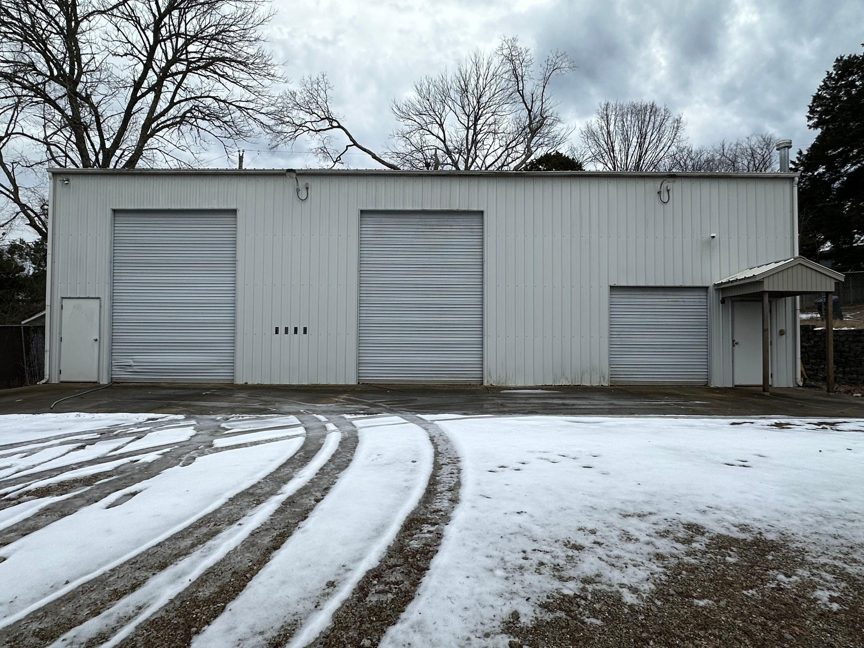 Extra large, interior-segmented space currently used to house a variety of items for large theatre in Branson.  The building consists of multiple garage doors, interior-completed room and large balcony-loft area.  The possibilities are endless.  The property is conveniently located near the Branson strip and could be connected to sewage and water systems.