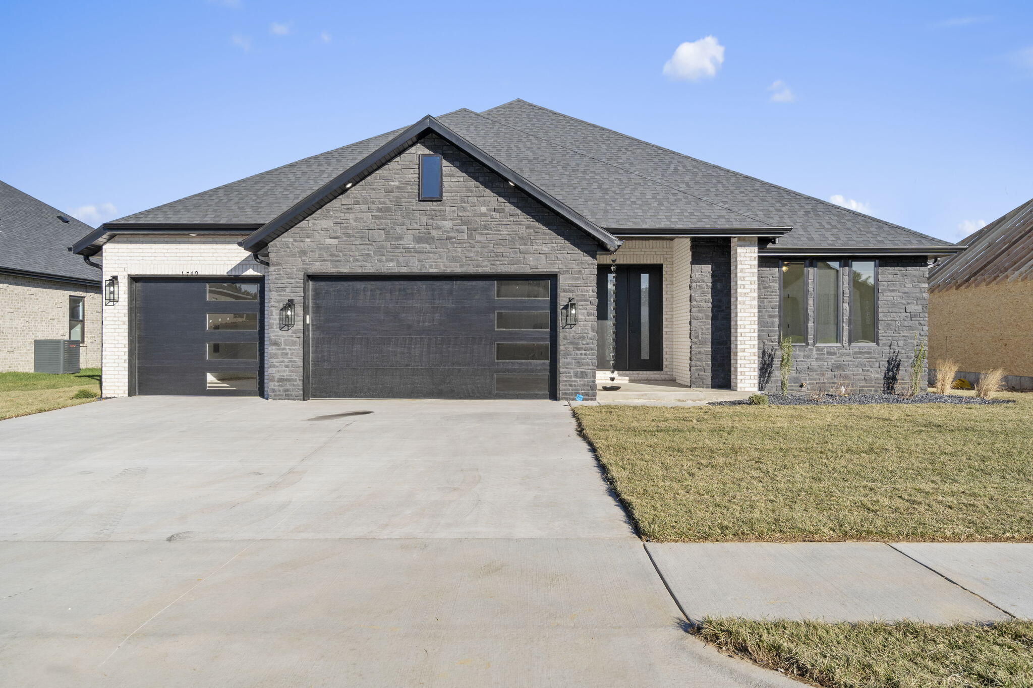 Introducing this stunning new construction home in Ozark's newest subdivision! This thoughtfully designed 5 bedroom, 3 bathroom home features an inviting open concept layout with tall vaulted ceilings in the great room, creating a spacious and warm atmosphere. The custom kitchen is a true centerpiece, boasting sleek quartz countertops and high-quality cabinetry. Oversized windows fill the home with abundant natural light, enhancing its warm and welcoming feel. The split bedroom floor plan offers privacy and functionality. The master bathroom features a large tile shower with sleek finishes throughout.  Don't miss the opportunity to make this beautifully crafted home yours!