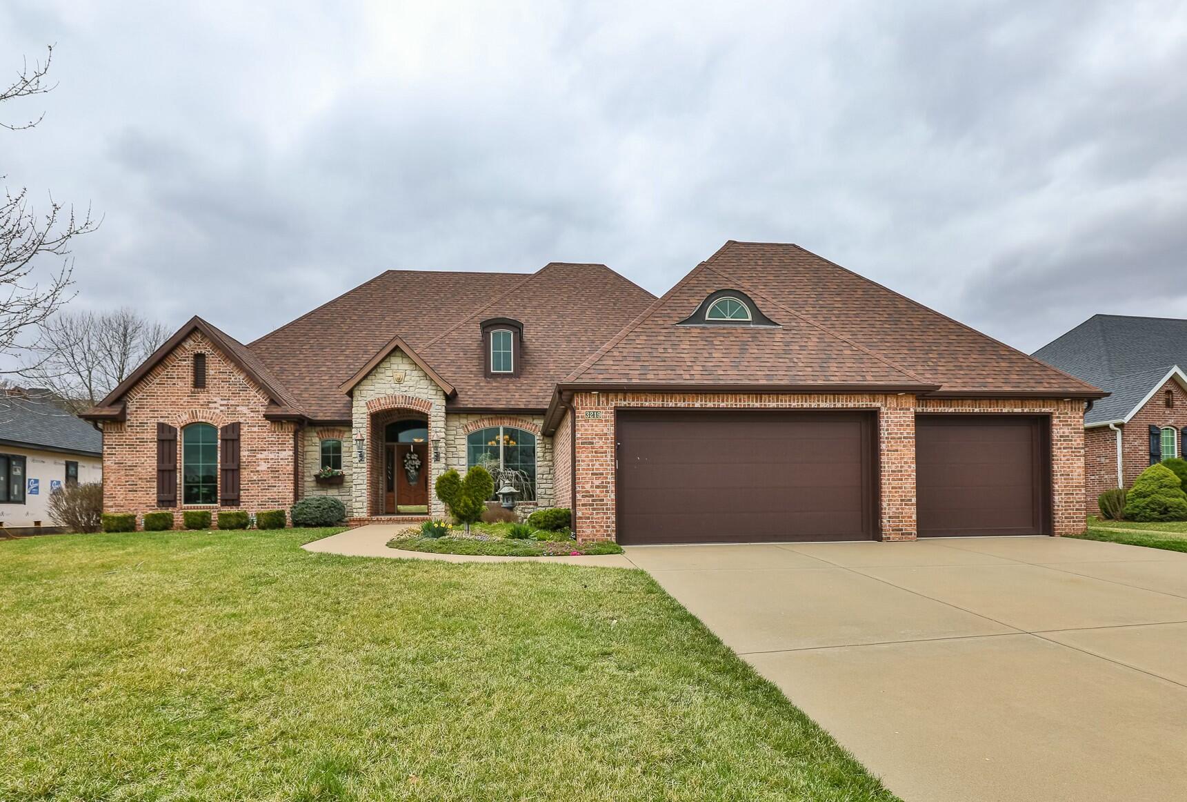 Welcome to 3219 W Rivulet Pass, a breathtaking 5-bedroom, 3.5-bath home designed for both comfort and style. Nestled in the highly sought-after Rivercut Golf Community, this home offers unparalleled views of the 13th Fairway through walls of windows in the fabulous kitchen and living room. Step inside to find a spacious, open floor plan, perfect for entertaining or relaxing by the cozy fireplace. The gourmet kitchen boasts high-end finishes, ample counter space, a large island, and a built-in wine cooler. The luxurious primary suite offers a spa-like bath with dual vanities, a walk-in shower, and a soaking tub, plus convenient access to a storm shelter through the walk-in closet. With all bedrooms featuring walk-in closets, multiple living areas, this home has it all! Located in the highly acclaimed Kickapoo School District, it offers top-tier education along with an incredible living experience. Enjoy the beauty of Rivercut with picturesque landscaping, walking trails, and access to community amenities. Call for your private showing today!