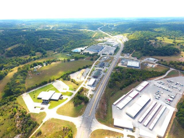 Catch the wave in this bustling commercial area at an opportune time! Once primarily pastureland in a small rural setting, this area has transformed and exploded over the past two decades and is currently experiencing another influx of building and business growth that is sure to be only a ripple within a perpetual flow. The location, within 1 mile of the MO/AR state line, coupled with the more advantageous tax base of Southwest Missouri make this area a very attractive place to establish a business, conduct commerce and benefit alongside others doing the same. Undeveloped tracts of ground of this size, along this corridor simply don't exist anymore and with this one abutting several great commercial tracts while being in close proximity to many more give it vast potential.