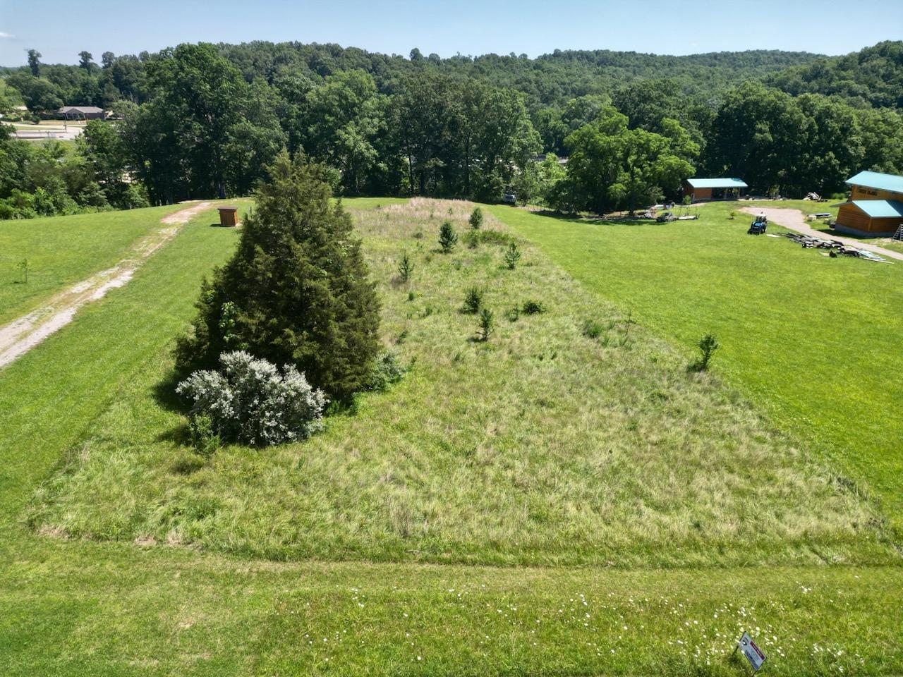 PRIME SPRING RIVER LOT over looking Dam 3! Put down your roots on this prime 1.1 acres sitting on the banks of Spring River! Located ideally on paved dead-end street, lot has utilities including city water, high speed internet and underground electric on site ready for you to build your dream home or weekend getaway! Lot sits in gated community with amenities such as club house, controlled access, and common use areas for owners! Offered at $64,900. Owner will consider owner financing to well qualified buyers. Call today for more information or to come take a look!