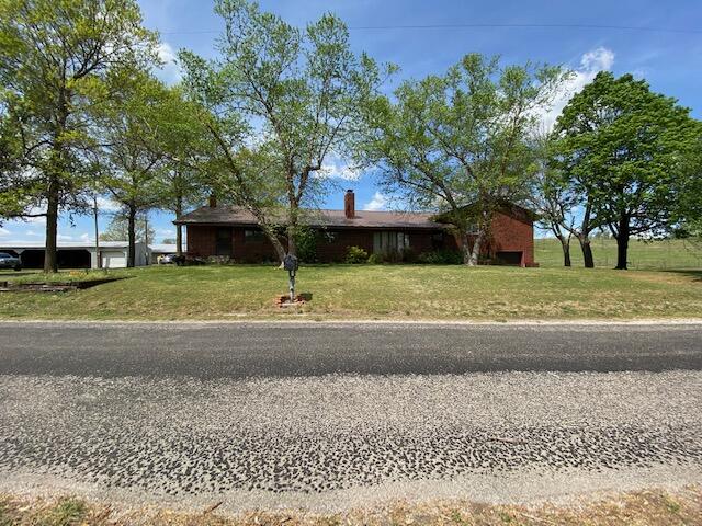 Southwest Missouri Ranch is an incredible 365+/- Acre combination Hunting/Cattle Ranch boasting 80% cattle grazing ground as well as 30 minutes from Stockton Lake fishing/boating just 35 minute drive to Springfield MO. This ranch also has CLEAR live water!! Multiple springs and Ponds. Sycamore Creek provides an abundance of fresh, live water! There's a 4 bed, 3 bath Brick home that spans 3650 square feet as well a mother-in-law quarters. With an incredible in-ground swimming Pool. For entertaining family and guest. To an incredible working cattle operation, to numerous hunting and recreational opportunities, this property is very versatile. The cattle ground consists of rolling pasture that has top notch fencing with pipe corners and working corral systems. There's bottom fields and ridge top fields that are ideal for hay production. At full operating capacity, the ranch will support approximately 100 cow/calf pairs. The ranch has a catch alley leading up to a catch lot with pipe corrals in place for working livestock. The live water on this property is second to none in the area. Multiple springs run throughout the property offering fresh water year round for livestock and wildlife. The timber and hunting opportunities on the Ranch are endless. The mature timber spans ridge tops and mostly consists of an abundance of marketable walnut. This Ranch boasts an incredible population of whitetail deer, turkeys and numerous small game animals. With multiple deer stands and blinds already in place! Enjoy the Hunting seasons and viewing the outdoor wildlife year around. The Ranches centerpiece being 4 bed, 3 bath brick home. The home features a master bedroom and bathroom that has a jetted tub. The kitchen has a large amount of counter space, an electric stove and dinning area. The spacious living room offers as well as a cozy fireplace. With a heated in-ground pool for catering holiday parties. Purchase House $1,150,000 possible owner financing of remainder acreage