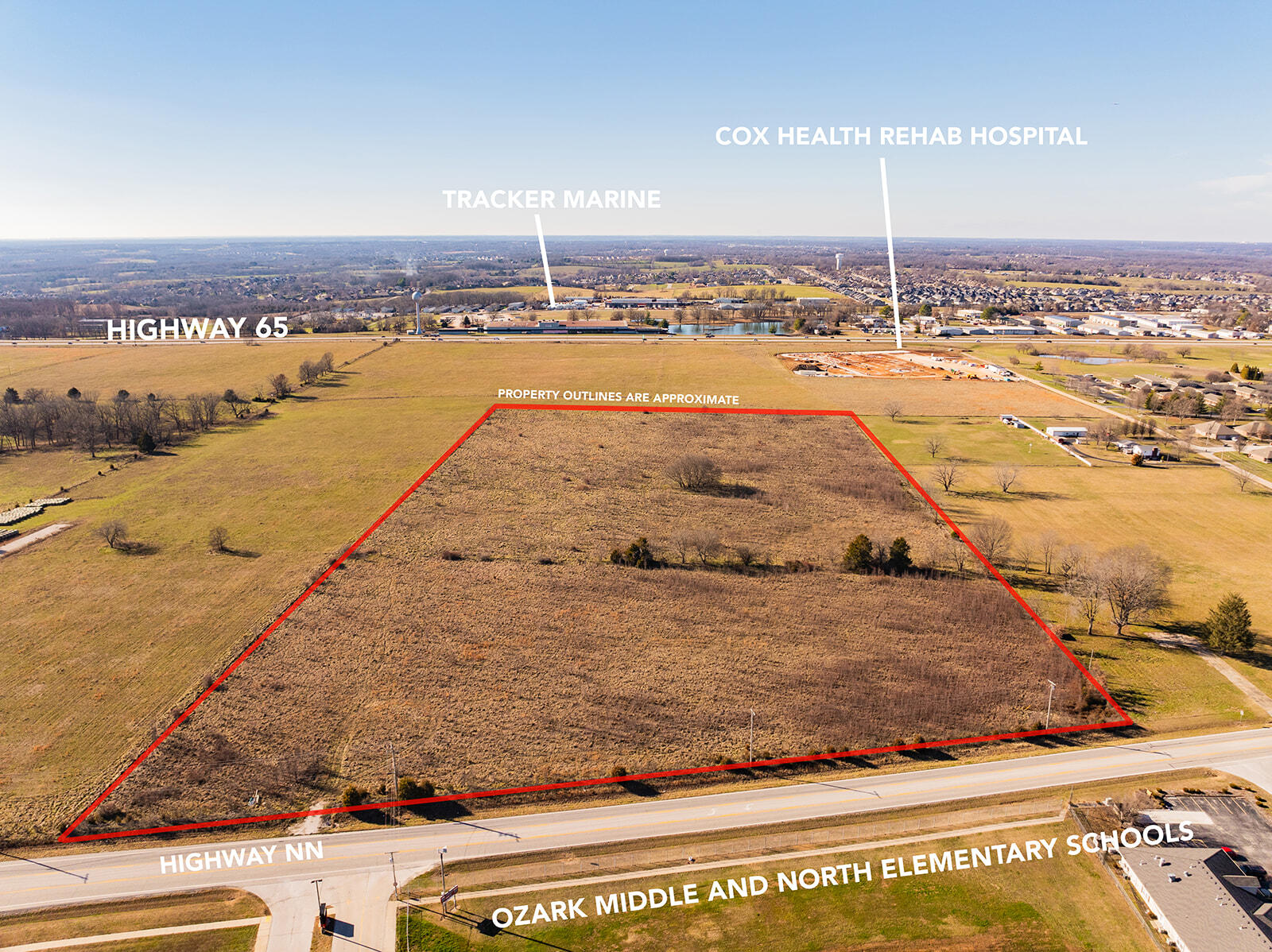 Located along busy North Hwy NN and across from the Ozark Middle and North Elementary Schools with over 700 feet of Hwy NN frontage.  This site is adjacent to the Cox Health Rehabilitation Hospital, which is under construction.  This property is easily accessible from the Hwy 65 interchanges of Hwy CC/J to the north and Jackson St to the south. Neighboring businesses include Baptist Home of the Ozarks, Ozark Mountain Sports Complex, Ozark High School, Finley Farms, and the Ozark Mill. The property is located in Christian County and is currently zoned Agriculture; annexation and new zoning will be with the city of Ozark. The 2024 property taxes are $58.07 for both parcels.
