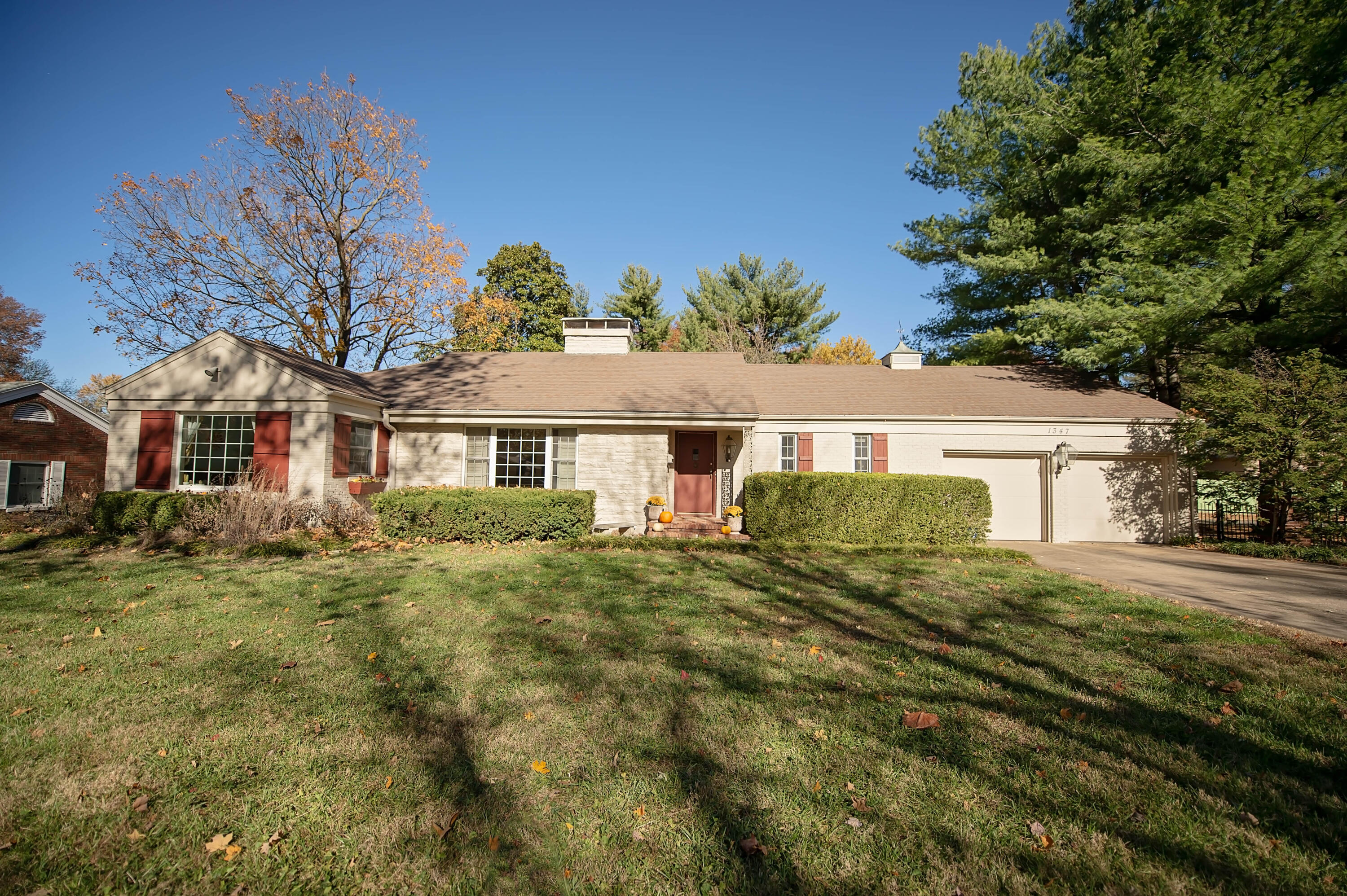 Open house 3/8 2 PM-4 PM!Welcome to the tree-lined street of Loren in the popular Rountree neighborhood! This beautiful ranch offers incredible square footage on one level. The stately lot has been thoughtfully designed and offers space between the homes, measuring .48 acres.  The landscapes, many native species, and gorgeous trees are exceptional. The floor plan flows with an open kitchen, dining, and family room. The EnSuite is tucked away at the rear of the home with its own hallway adding to the privacy.  There is a separate in-law or guest area and perfect spots for home offices. The kitchen will appeal to those who love to cook, with an eat-in bar to keep you connected to your guests. The home is filled with natural light from the large windows. A majority of the home is in wood floors, which these sellers refinished. Many improvements have been made over the years, such as a TPO roof (state-of-the-art commercial system) on the rear of the home, windows are Pella and Anderson, energy audited, and insulation added to the attic at R-49 level, and a functional kitchen. Several prominent Springfield families have previously owned this home, and the quality of improvements is obvious! This home has been so well maintained, and the level of clean is impeccable!  The garage is an impressive size at 500 sq ft!  The back patio in brick and stone balusters is an incredible space. A tall brick serpentine wall is the highlight, along with a mature magnolia tree. The exterior materials are of high quality, mostly brick and Carthage stone, with Cypress on the rear of the home.  The location of this home is special. Loren St is a boulevard-type street with a mature tree canopy that is stunning in the fall. It is also very close to MSU, Mercy Hospital, Phelps Grove Park, the Art Museum, and Rountree Elementary School. This is on the south end of Rountree, but still very walkable and bikeable to the corner restaurants and small local businesses that are well-loved