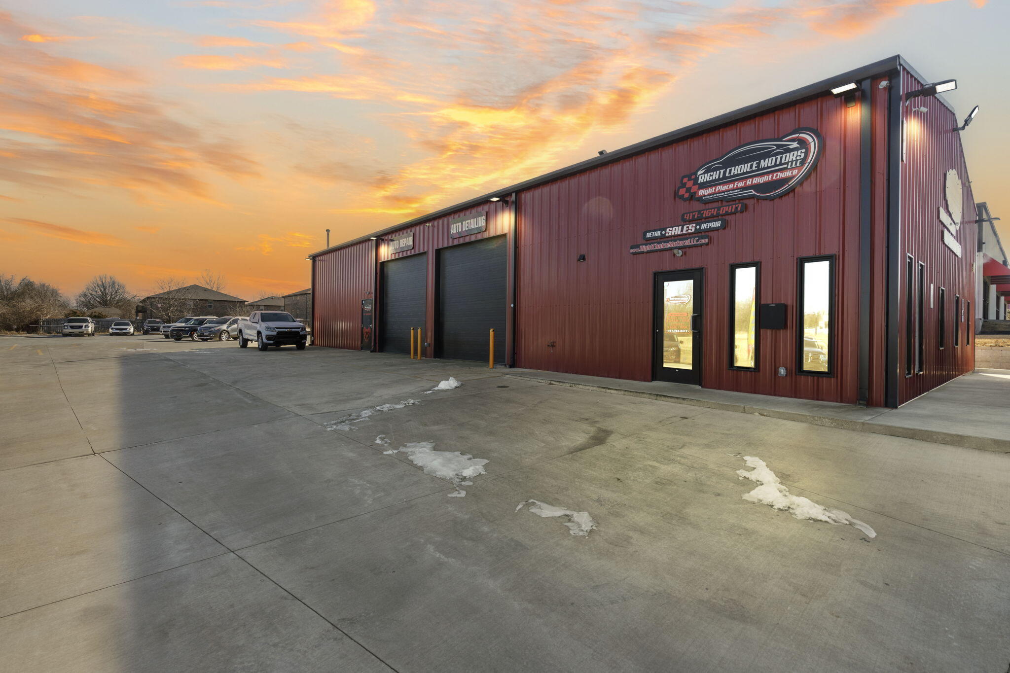 Positioned in a prime, high-traffic location in Springfield, this C2-zoned commercial property offers exceptional visibility and functionality for a variety of business uses. The versatile metal building is fully equipped with two hard-wired air compressors and three automobile lifts, making it an outstanding choice for automotive, service-based, or industrial operations. A brand-new electronic sign installed this year provides enhanced visibility to passing traffic, maximizing business exposure.  This turnkey property also has an upstairs living quarter featuring a full kitchen and a spacious living area, ideal for an owner-operator, on-site manager, or additional office space. The high-ceiling garage bays with oversized doors offer plenty of workspace, vehicle storage, or expansion for business opportunities.  What sets this property apart is its growth potential. With building plans and completed plumbing for a second commercial structure to the East, it offers a rare expansion opportunity in a thriving commercial area. This prime location is move-in ready and built for long-term success making this a smart investment for business owners and entrepreneurs.