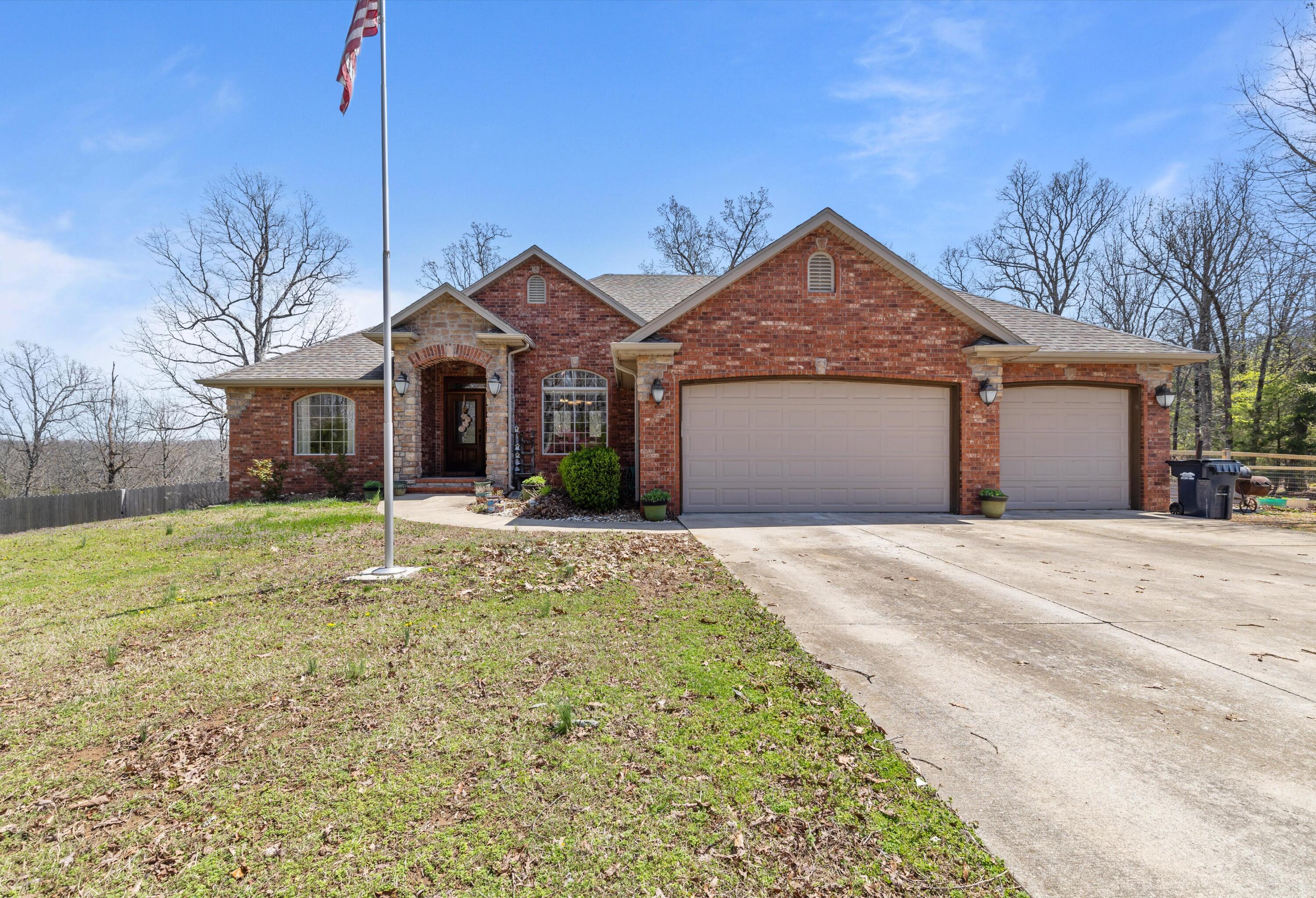 Prepare to be amazed by the spaciousness of this home, which offers a total of 4,062 square feet --including 840 square feet of unfinished storage space in the basement. This area encompasses the John Deere room, which features double doors to the exterior and could easily be finished to suit your needs. Don't miss the Matterport 3D virtual walkthrough link. Welcome to your private retreat at the end of a peaceful dead-end street, nestled on 5.14 acres of picturesque, partially wooded land. This stunning all-brick and stone custom-built home, completed in 2008, offers a serene escape just minutes north of Springfield and near Fellows Lake with scenic walking trails. The property offers breathtaking views of mature trees and tranquil nature, creating the perfect backdrop for relaxation. Whether you're sipping your morning coffee on the screened-in back deck or enjoying the view from the walk-out patio below, you'll feel immersed in natural beauty.Inside, you'll be greeted by soaring 10-foot ceilings and a spacious open-concept layout. The kitchen, with ample cabinet and counter space, connects seamlessly to the living and dining areas, making it perfect for both everyday living and entertaining. The private primary suite, located on the main floor, features a tray ceiling and a relaxing soaker tub, providing a peaceful sanctuary at the end of the day.The home boasts five bedrooms and three full bathrooms, with three bedrooms located upstairs and two downstairs. The split floor plan offers privacy for the primary suite, making it a perfect retreat. The walk-out basement includes two living areas and versatile spaces, including a John Deere room and a storm shelter, offering extra peace of mind during inclement weather.Situated in the highly regarded Fair Grove School District, this property offers a blend of indoor and outdoor living. The expansive yard is perfect for outdoor activities, and with no HOA, you'll enjoy privacy and tranquility while