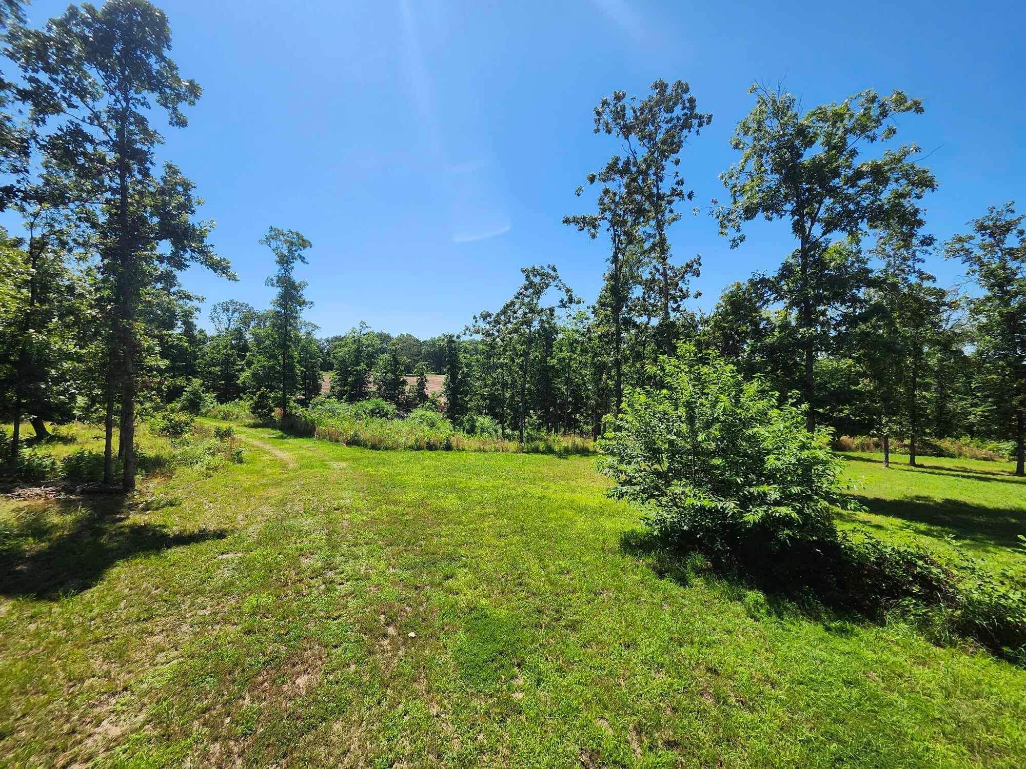 Nice 7 acres M/L off the road main road just a bit, 1 mile off of UU Highway. This property is like a park that is ready for you and yours. Buy land and you will have something to pass to the Next Generation.. Come give this a look today.