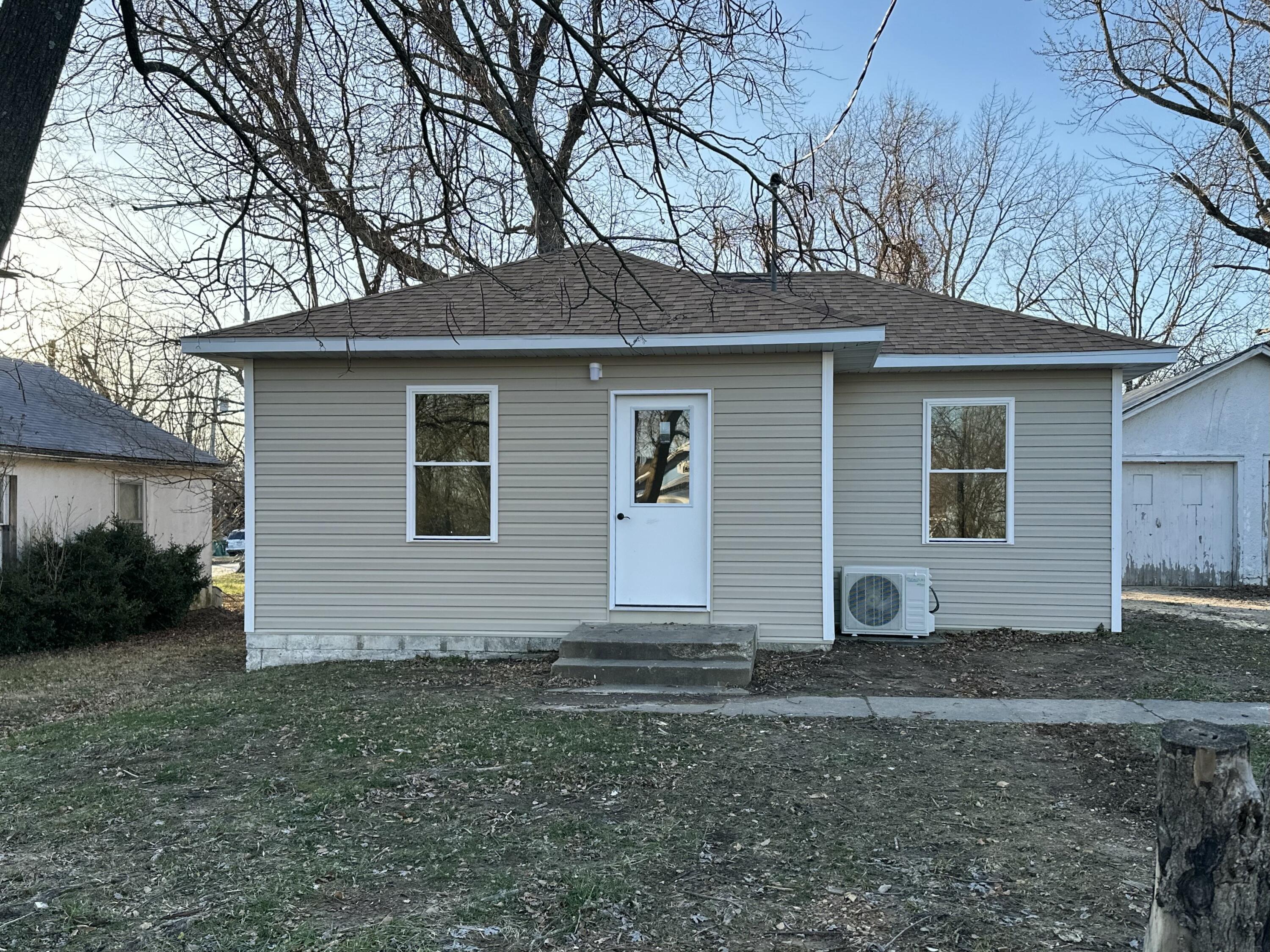Welcome to 219 S High St, Mountain Grove, MO! This completely remodeled 2-bedroom, 1-bath home with a 1-car detached garage is ready to impress. Enjoy the peace of mind that comes with all-new updates, including windows, plumbing with PEX, electrical wiring, and R-30 insulation for energy efficiency. The reimagined layout creates a modern and functional space, complemented by new siding, doors, and a mini-split system for year-round comfort. The kitchen shines with brand-new appliances, complete with an extended warranty. Every detail has been thoughtfully upgraded, making this home a perfect blend of style, comfort, and quality.