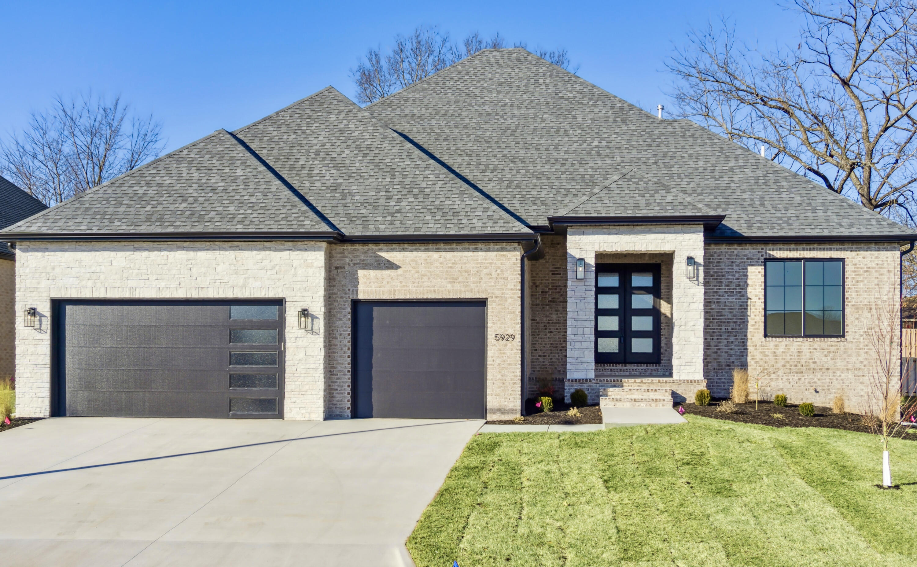 Welcome to Phase 3 of Hickory Hills! A distinguished, gated community with available access to Hickory Hills Country Club.  This exceptional New Construction home is completed and move in ready featuring 4 bedrooms, 3 baths, All brick and stone, Impressive Open floor plan, tall ceilings, hardwood flooring thoughout, quartz counters, designer lighting, two-tone Kitchen with stunning custom cabinetry, walk-in pantry, spacious covered patio, and many more amazing finishes!  Great location close to shopping, HWY 65, dining, entertainment and more. A must see! Don't miss this one!