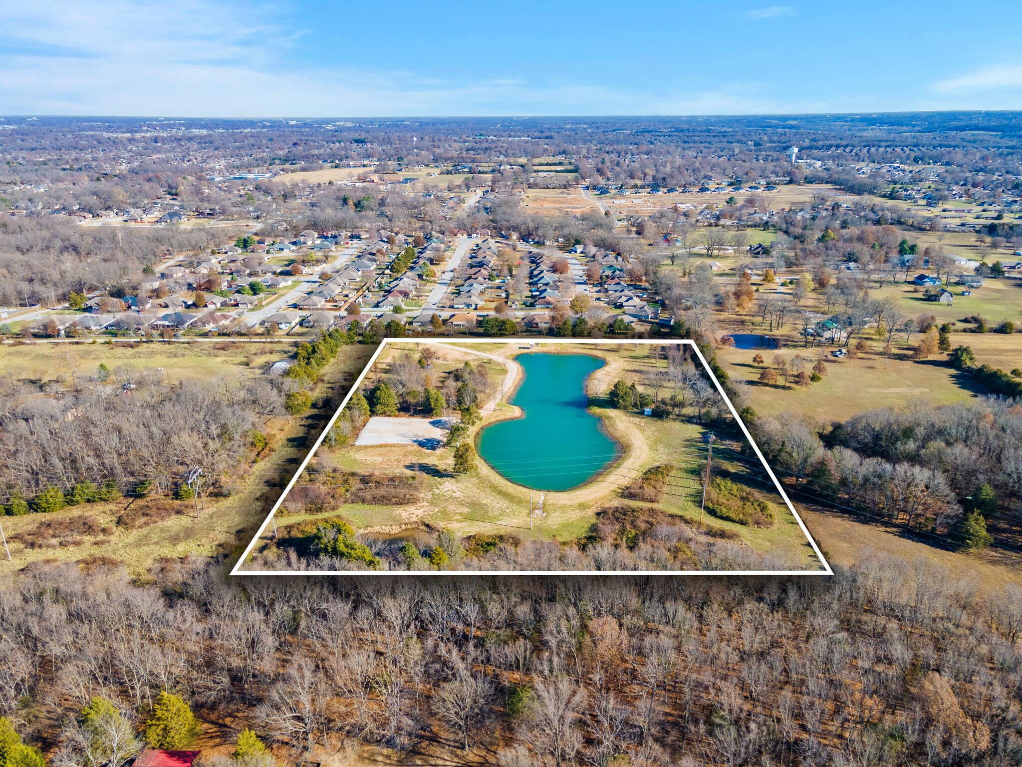 10 ACRES of the most serene and private setting. Flat and perfect place to build your new home. The property consists of TWO 5-acre parcels of land with a large pond that ranges from 15'-17' deep. Pond is currently stocked with minnow, perch, bass, catfish, carp and crappie. There is a new well in place and power ran to nearby build locations. Private and gated access makes this a private and one of a kind property. Builder available if needed. Current parcels ID's are #1819200138 and#1819200139. Can be sold together or individually. Great location and close to amenities but still private.