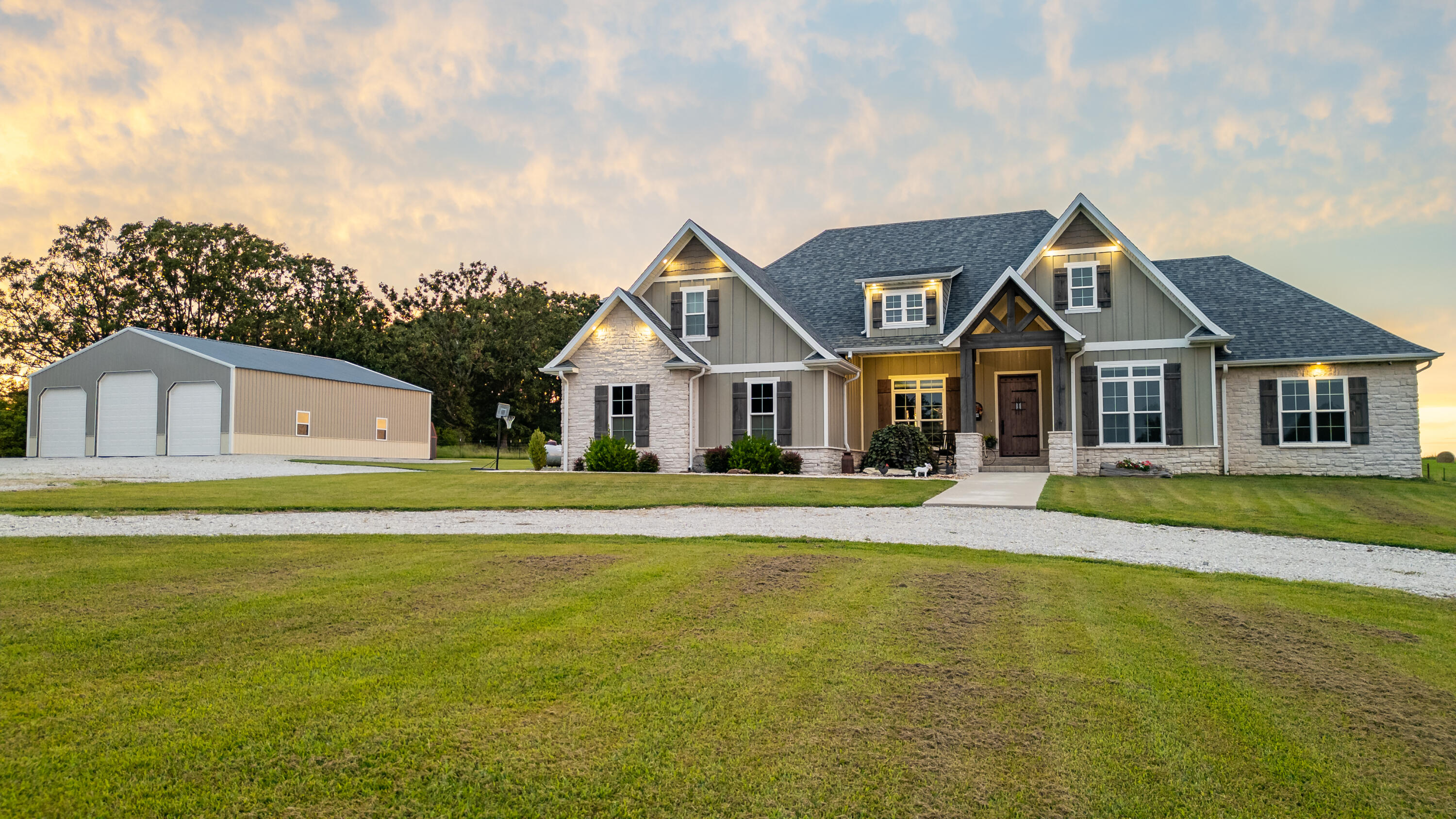 Beautiful Custom Home built 2020 with 40x50 shop building.Missouri farm includes 6 paddocks, fencing for livestock, cattle working facility, barn, 4 ponds - one stocked with bass & crappie, one spring, at the start of Big Piney River!Inside the home the kitchen features quartz countertops, double oven, pot filler, custom cabinetry, LED lighting under cabinets, farmhouse sink with beautiful view, large walk-in pantry with plug ins, large island for seating & entertaining; plus, storage on both sides!The living room features surround sound, gas fireplace with built-in book case on one side and built-in bench with storage on the other side.The home has open concept to kitchen and living room, hardwood floors throughout, hardwired security system, large custom windows throughout the house providing natural lighting, heating and air on 3 zones.  The laundry room has built-in storage for baskets, utility sink, lots of shelving and cabinetry. The master suite is spacious with master bath attached that includes double vanity, walk-in shower, luxurious free-standing tub, and walk-in closet with custom cabinetry.Bathroom two is located between two bedrooms with double vanity, shower tub combo, and the large powder bathroom is off the kitchen.The 3 additional bedrooms feature great views, large windows, walk-in closets with custom shelving and cabinetry.The 5th bedroom or BONUS ROOM is above the attached garage.  In the garage you have the storm shelter, mechanical room, lots of additional storage PLUS ample storage in the attic.Outside there is a playground that stays, pool that is 58 inches deep and 28 feet around with attached deck.  The back patio is covered and has an outdoor custom kitchen, outside gas grill hooked up to propane tank, 40x50 shop building with gravel floor, electric and 50 amp hook-up for camper.GREAT LOCATION, a short distance to Mountain Grove, MO or Cabool, MO - situated just off US Highway 60.Additional purchase options!