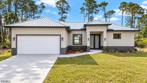 Tiny photo for 754 Genoa Avenue S, Lehigh Acres, FL 33974 (MLS # 2026039784)