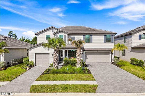 Photo of 10712 Timber Creek Drive, Fort Myers, FL 33913 (MLS # 2026039359)