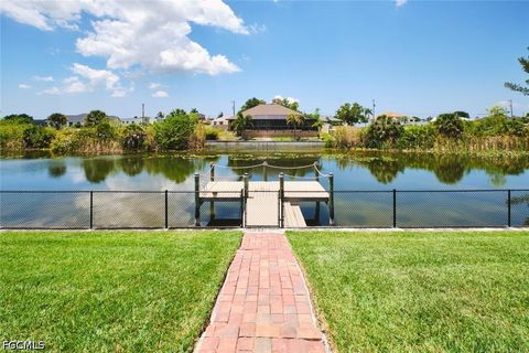 Tiny photo for 844 NE 6th Avenue, Cape Coral, FL 33909 (MLS # 2026020072)