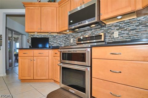Tiny photo for 844 NE 6th Avenue, Cape Coral, FL 33909 (MLS # 2026020072)