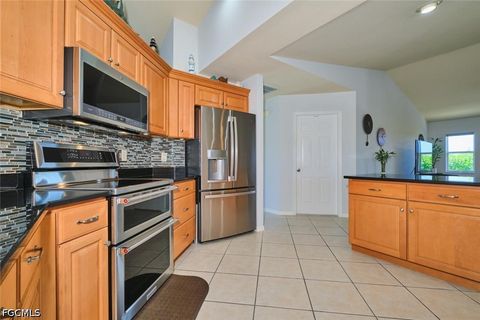Tiny photo for 844 NE 6th Avenue, Cape Coral, FL 33909 (MLS # 2026020072)